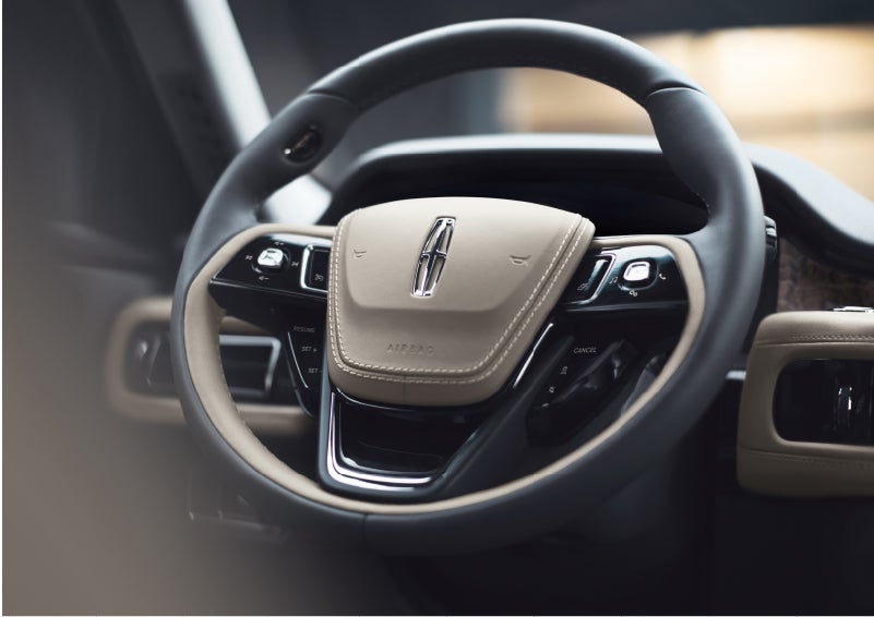 The intuitively placed controls of the steering wheel on a 2023 Lincoln Aviator® SUV | Lidtke Lincoln in Beaver Dam WI