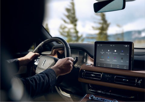 The Lincoln+Alexa app screen is displayed in the center screen of a 2023 Lincoln Aviator® Grand Touring SUV