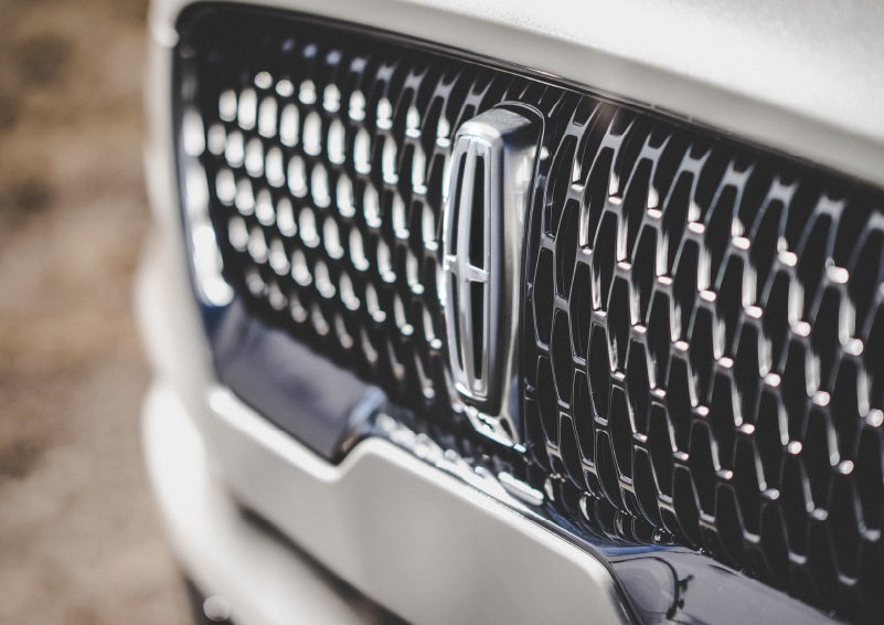 The grille of the 2024 Lincoln Aviator® Reserve model with an eye-catching repeated field of Lincoln Star logo shapes | Lidtke Lincoln in Beaver Dam WI
