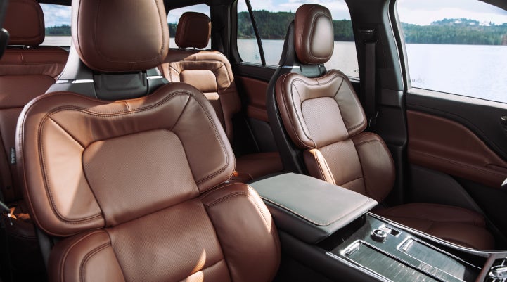 The front row's Perfect Position Seats in a 2024 Lincoln Aviator® Reserve model with Ebony Roast interior | Lidtke Lincoln in Beaver Dam WI